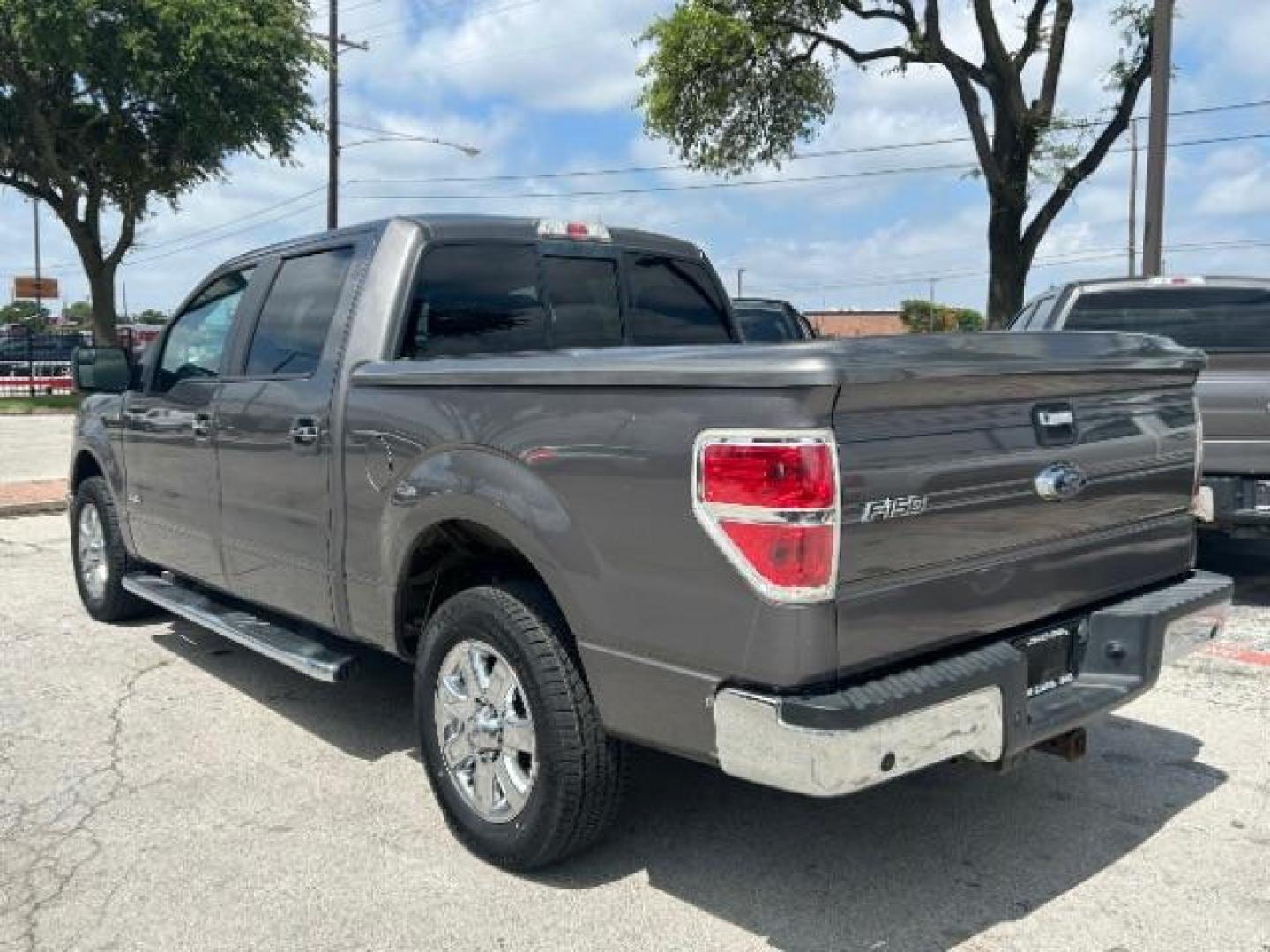 2014 Sterling Gray Metallic Ford F-150 XLT (1FTFW1CT2EK) , located at 12182 Garland Rd, Dallas, TX, 75218, (214) 521-2040, 0.000000, 0.000000 - Photo#2