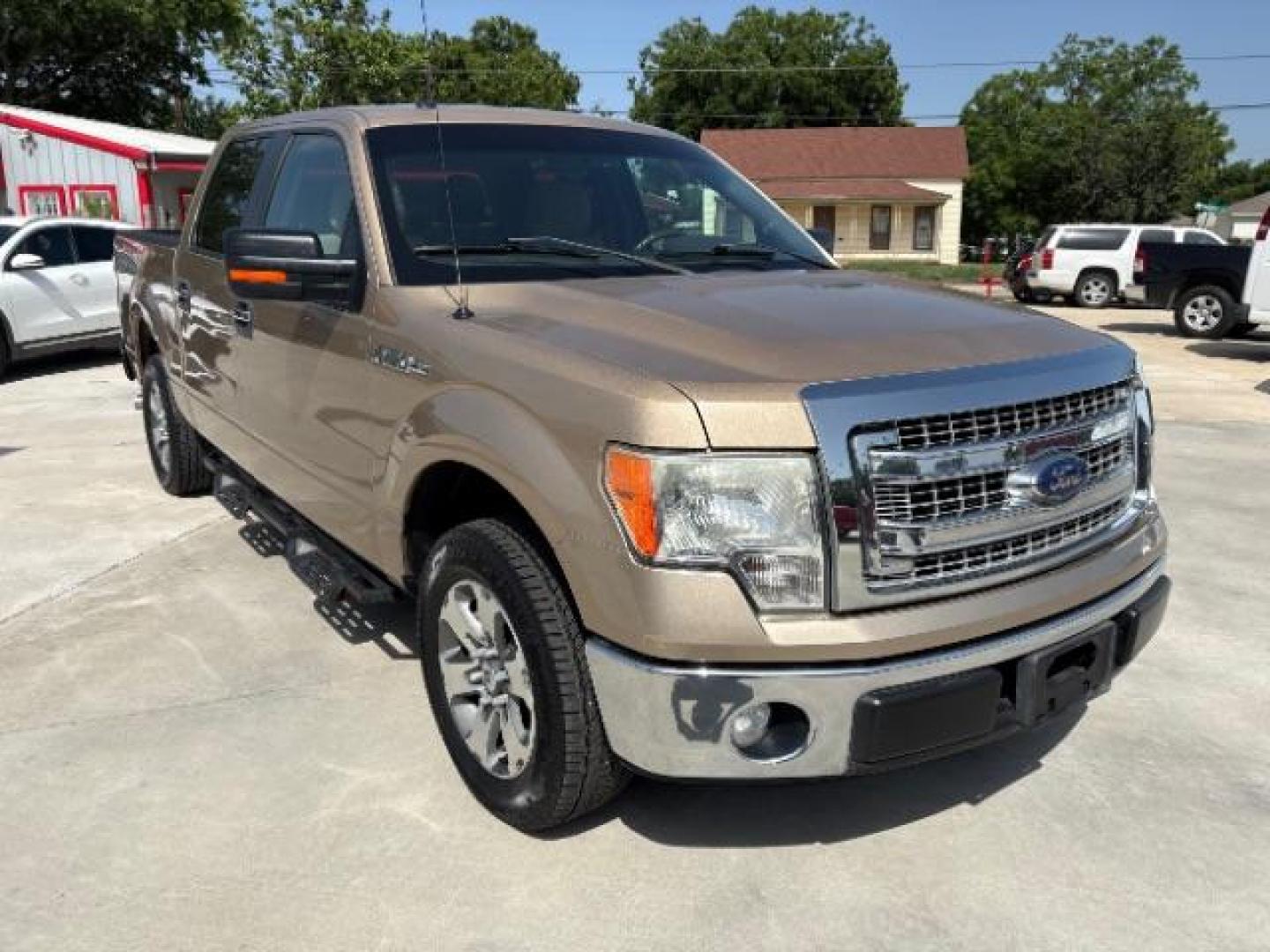 2014 Pale Adobe Metallic Ford F-150 XLT (1FTFW1CF1EK) with an 5.0L V8 engine, located at 12182 Garland Rd, Dallas, TX, 75218, (214) 521-2040, 0.000000, 0.000000- Photo#0