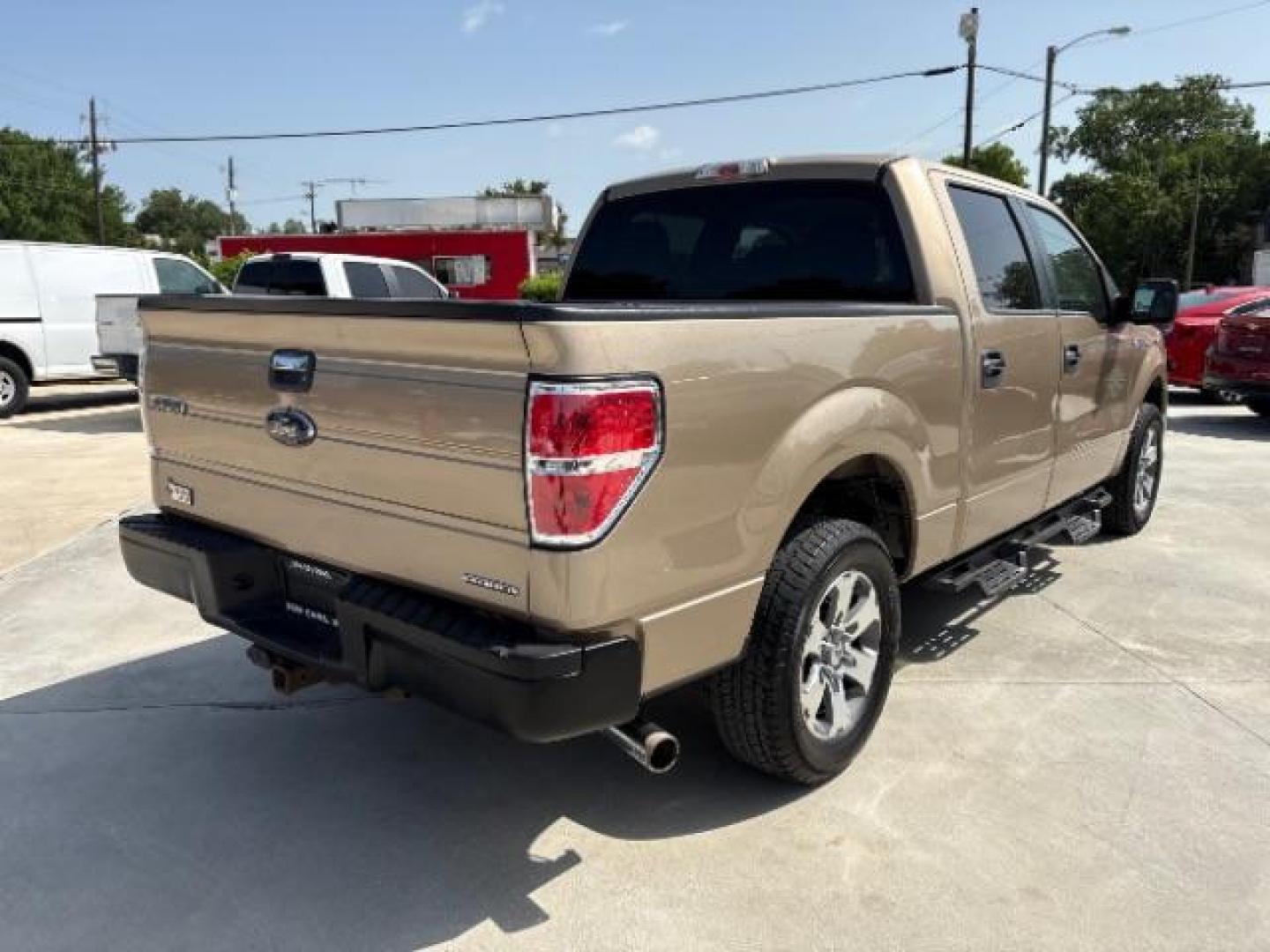 2014 Pale Adobe Metallic Ford F-150 XLT (1FTFW1CF1EK) with an 5.0L V8 engine, located at 12182 Garland Rd, Dallas, TX, 75218, (214) 521-2040, 0.000000, 0.000000- Photo#4