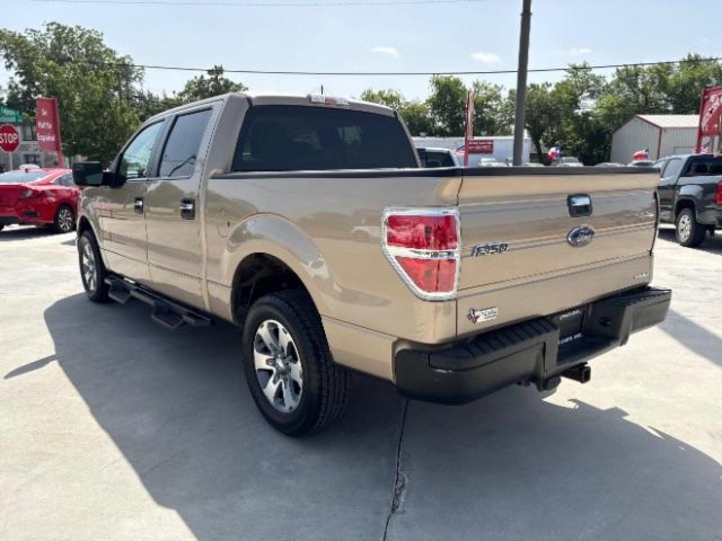 2014 Pale Adobe Metallic Ford F-150 XLT (1FTFW1CF1EK) with an 5.0L V8 engine, located at 12182 Garland Rd, Dallas, TX, 75218, (214) 521-2040, 0.000000, 0.000000- Photo#6
