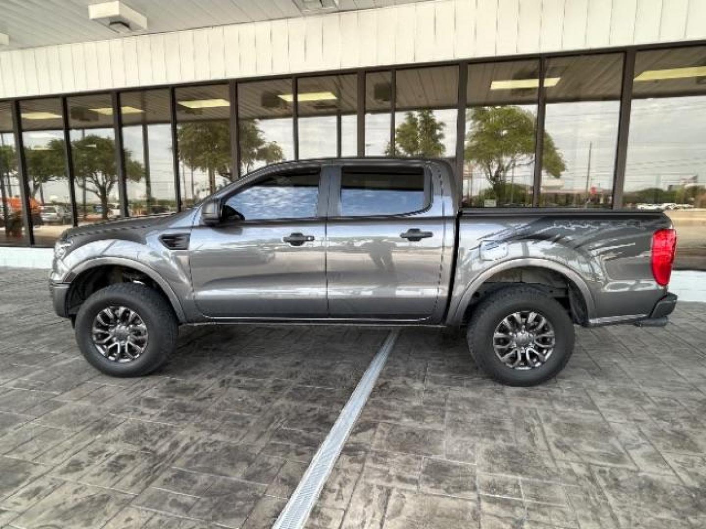 2019 Magnetic Metallic /Medium Stone Ford Ranger XLT (1FTER4EH8KL) with an EcoBoost 2.3L I-4 gasoline direct injection engine, ELEC 10-SPEED AUTO TRANS transmission, located at 12182 Garland Rd, Dallas, TX, 75218, (214) 521-2040, 0.000000, 0.000000- Photo#3