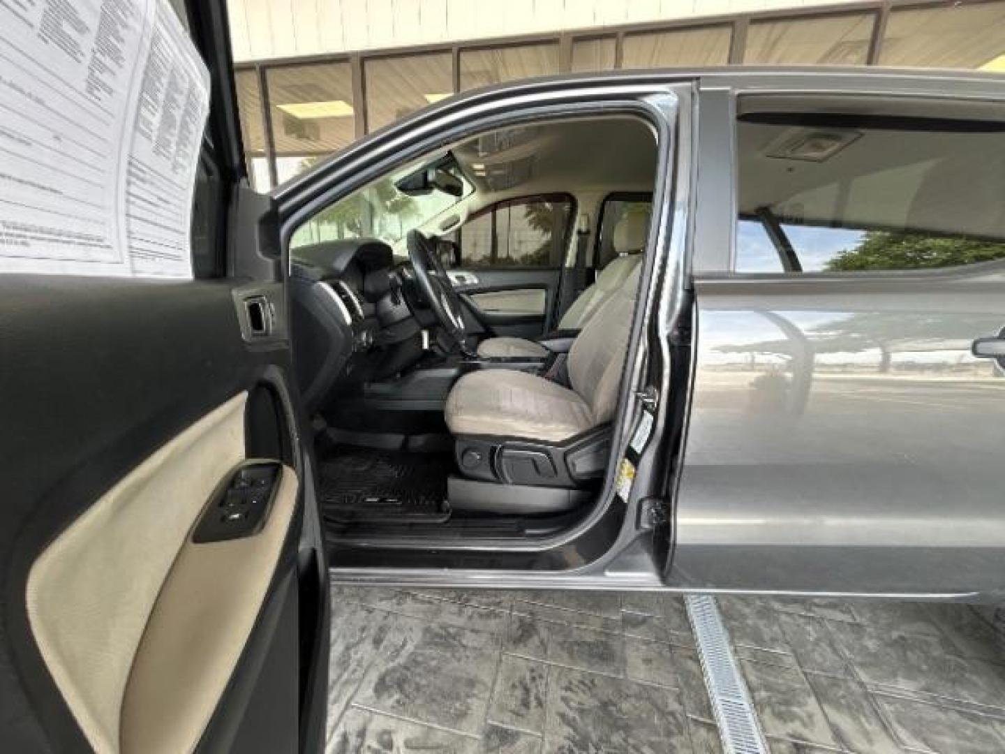 2019 Magnetic Metallic /Medium Stone Ford Ranger XLT (1FTER4EH8KL) with an EcoBoost 2.3L I-4 gasoline direct injection engine, ELEC 10-SPEED AUTO TRANS transmission, located at 12182 Garland Rd, Dallas, TX, 75218, (214) 521-2040, 0.000000, 0.000000- Photo#15