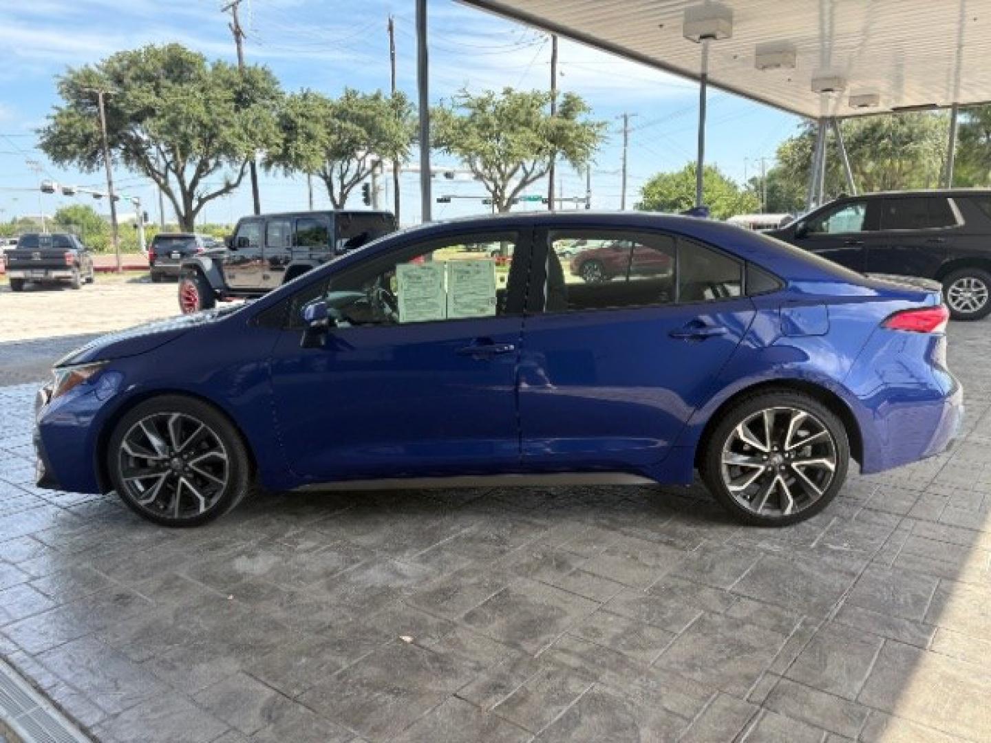 2020 Blue Crush Metallic Toyota Corolla SE (JTDP4RCE6LJ) with an Dynamic Force 2L I-4 port/direct injection engine, located at 12182 Garland Rd, Dallas, TX, 75218, (214) 521-2040, 0.000000, 0.000000- Photo#3