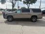 2019 Pepperdust Metallic Chevrolet Suburban LT (1GNSKHKC0KR) with an EcoTec3 5.3L V-8 gasoline direct injection engine, located at 12182 Garland Rd, Dallas, TX, 75218, (214) 521-2040, 0.000000, 0.000000- Photo#1