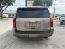 2019 Pepperdust Metallic Chevrolet Suburban LT (1GNSKHKC0KR) with an EcoTec3 5.3L V-8 gasoline direct injection engine, located at 12182 Garland Rd, Dallas, TX, 75218, (214) 521-2040, 0.000000, 0.000000- Photo#5