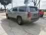 2019 Pepperdust Metallic Chevrolet Suburban LT (1GNSKHKC0KR) with an EcoTec3 5.3L V-8 gasoline direct injection engine, located at 12182 Garland Rd, Dallas, TX, 75218, (214) 521-2040, 0.000000, 0.000000- Photo#6