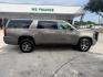 2019 Pepperdust Metallic Chevrolet Suburban LT (1GNSKHKC0KR) with an EcoTec3 5.3L V-8 gasoline direct injection engine, located at 12182 Garland Rd, Dallas, TX, 75218, (214) 521-2040, 0.000000, 0.000000- Photo#7