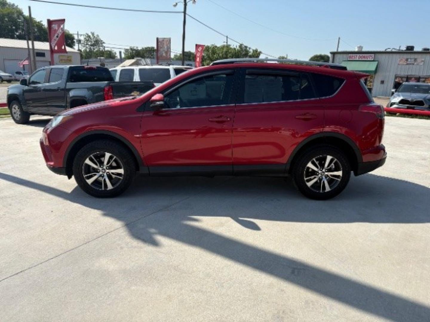 2017 Barcelona Red Metallic Toyota RAV4 XLE (2T3WFREV3HW) with an 2.5L I-4 DOHC engine, located at 12182 Garland Rd, Dallas, TX, 75218, (214) 521-2040, 0.000000, 0.000000- Photo#1