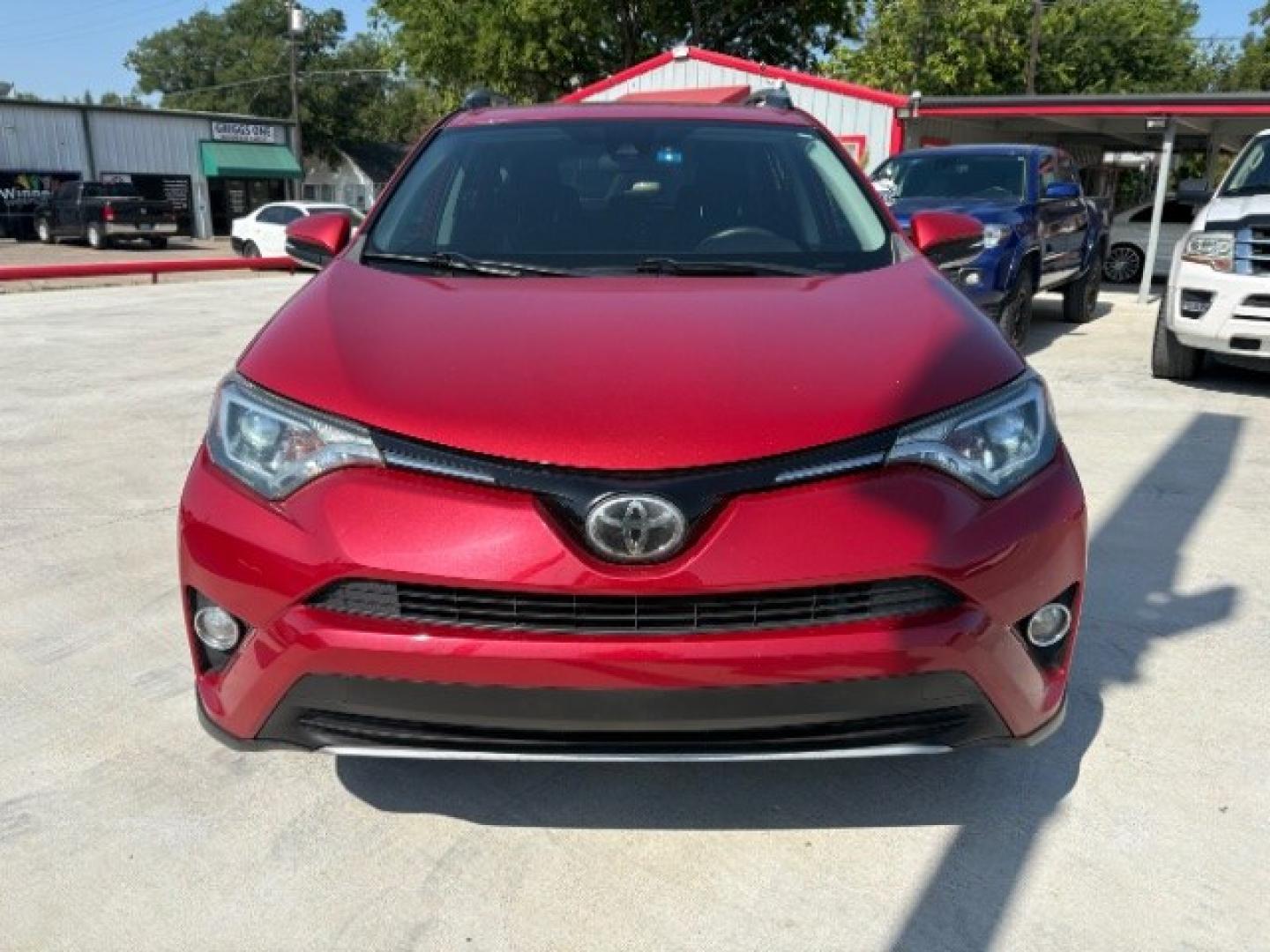 2017 Barcelona Red Metallic Toyota RAV4 XLE (2T3WFREV3HW) with an 2.5L I-4 DOHC engine, located at 12182 Garland Rd, Dallas, TX, 75218, (214) 521-2040, 0.000000, 0.000000- Photo#3