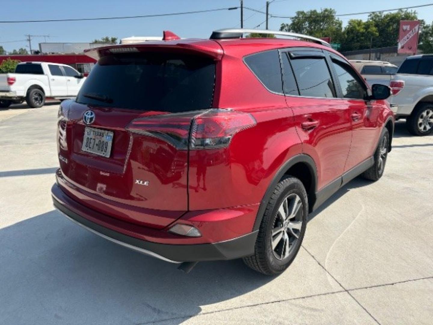 2017 Barcelona Red Metallic Toyota RAV4 XLE (2T3WFREV3HW) with an 2.5L I-4 DOHC engine, located at 12182 Garland Rd, Dallas, TX, 75218, (214) 521-2040, 0.000000, 0.000000- Photo#4