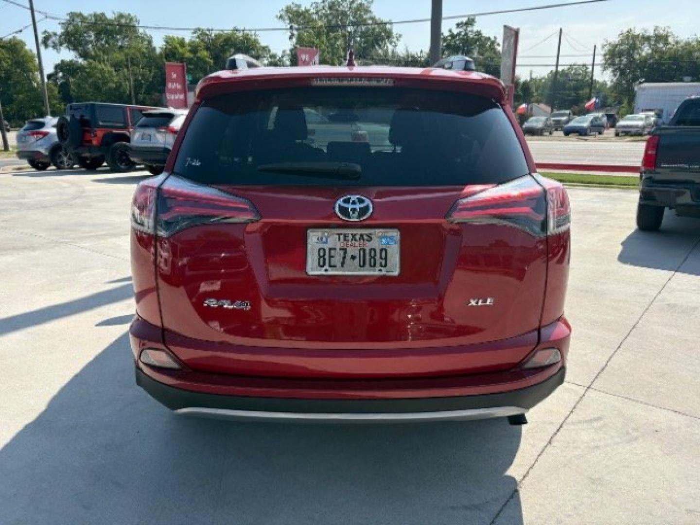 2017 Barcelona Red Metallic Toyota RAV4 XLE (2T3WFREV3HW) with an 2.5L I-4 DOHC engine, located at 12182 Garland Rd, Dallas, TX, 75218, (214) 521-2040, 0.000000, 0.000000- Photo#5