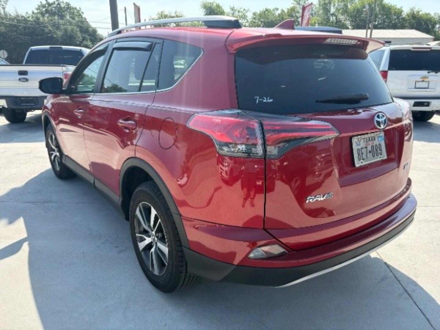 2017 Barcelona Red Metallic Toyota RAV4 XLE (2T3WFREV3HW) with an 2.5L I-4 DOHC engine, located at 12182 Garland Rd, Dallas, TX, 75218, (214) 521-2040, 0.000000, 0.000000- Photo#6