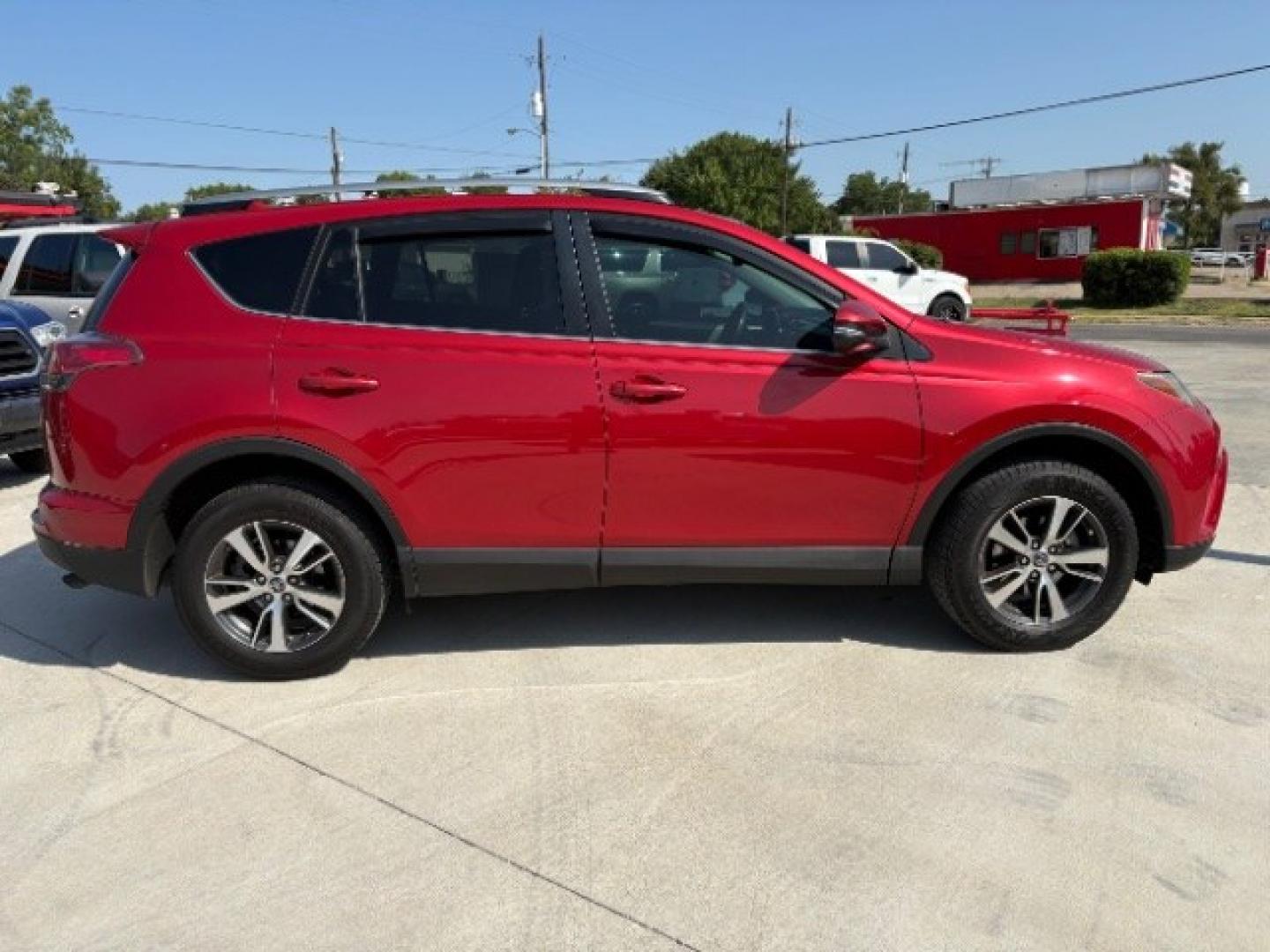 2017 Barcelona Red Metallic Toyota RAV4 XLE (2T3WFREV3HW) with an 2.5L I-4 DOHC engine, located at 12182 Garland Rd, Dallas, TX, 75218, (214) 521-2040, 0.000000, 0.000000- Photo#8