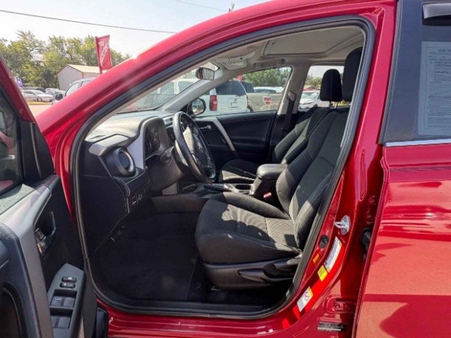 2017 Barcelona Red Metallic Toyota RAV4 XLE (2T3WFREV3HW) with an 2.5L I-4 DOHC engine, located at 12182 Garland Rd, Dallas, TX, 75218, (214) 521-2040, 0.000000, 0.000000- Photo#16