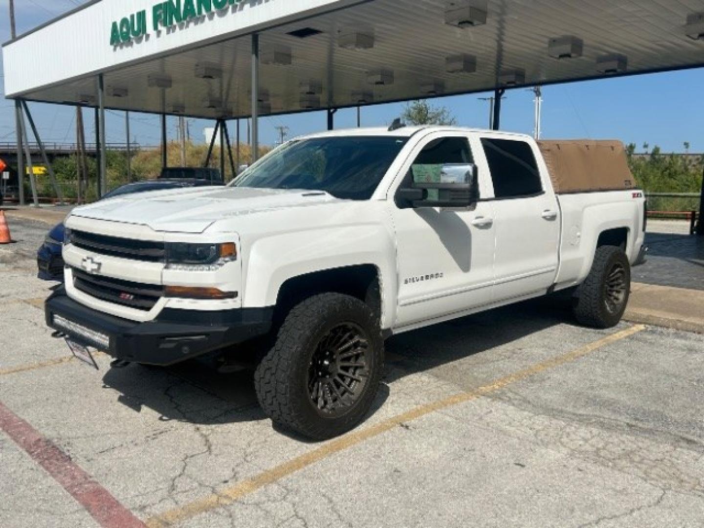 2017 Summit White Chevrolet Silverado 1500 LT (3GCUKREC5HG) with an EcoTec3 5.3L V-8 gasoline direct injection engine, located at 12182 Garland Rd, Dallas, TX, 75218, (214) 521-2040, 0.000000, 0.000000- Photo#2