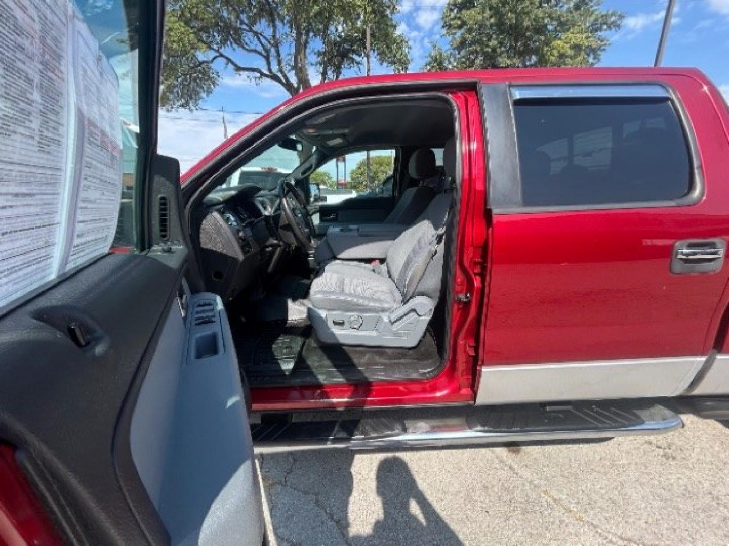 2013 Ruby Red Metallic Tinted Clearcoat /Gray Cloth 40 20 40 Ford F-150 XLT (1FTFW1EF7DK) with an 5L V-8 DOHC engine, 6-Speed Automatic transmission, located at 12182 Garland Rd, Dallas, TX, 75218, (214) 521-2040, 0.000000, 0.000000- Photo#12